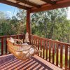double hanging chair on deck