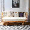 rattan lounge against white wall