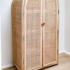 rattan hutch against a wall