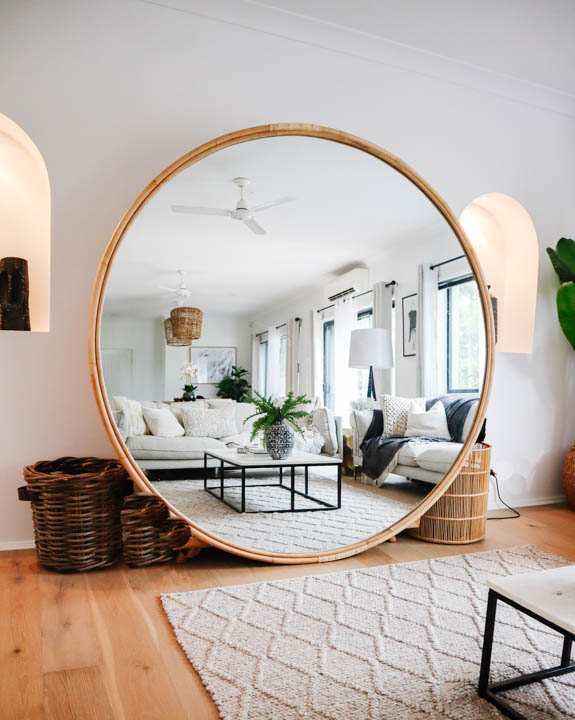 large round mirror with lights