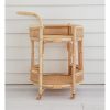 natural rattan bar cart against white wall