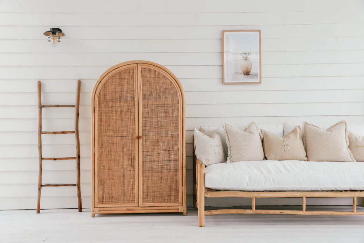 RATTAN HUTCH NEXT TO LOUNGE