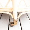 close up of brass wheel on bar cart