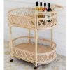 rattan bar cart with drink in top