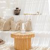 rattan reed round coffee table with candle on top