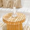 rattan reed round coffee table with candle on top