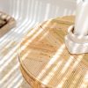 rattan reed round coffee table with candle on top